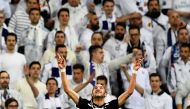 Ajax's Moroccan midfielder Hakim Ziyech celebrates after scoring a goal during the UEFA Champions League round of 16 second leg football match between Real Madrid CF and Ajax at the Santiago Bernabeu stadium in Madrid on March 5, 2019.  AFP / Gabriel Bouy