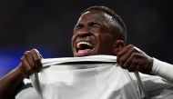 Real Madrid's Brazilian forward Vinicius Junior reacts as he walks off the pitch after getting injured during the UEFA Champions League round of 16 second leg football match between Real Madrid CF and Ajax at the Santiago Bernabeu stadium in Madrid on Mar