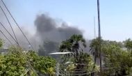 Smoke rises from an area hit by an explosion in Mogadishu, Somalia March 7, 2019 in this still image taken from a video obtained from social media. KHADAR SHIRE/via REUTERS
