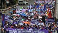 Activists from Gabriela march toward Malacanang palace to commemorate International Women's Day in Manila on March 8, 2019. AFP / Ted Aljibe
 