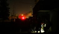 People stand outside a house during a blackout in Puerto Ordaz, Venezuela, March 9, 2019. REUTERS/William Urdaneta