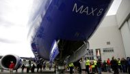 Boeing employees are pictured in front of a 737 MAX 8 produced for Southwest Airlines as Boeing celebrates the 10,000th 737 to come off the production line in Renton, Washington, U.S., March 13, 2018. Reuters/Jason Redmond