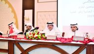 Sheikh Dr. Khalid bin Thani bin Abdullah Al Thani (left), Chairman and Managing Director of QIIB; and  Dr Abdulbasit Ahmad Al Shaibei, Chief Executive Officer of QIIB, during the Annual General Assembly meeting, yesterday.