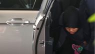 Indonesian Siti Aisyah, who is on trial for the killing of Kim Jong Nam, the estranged half-brother of North Korea's leader, arrives at the Shah Alam High Court on the outskirts of Kuala Lumpur, Malaysia March 11, 2019. REUTERS/Lai Seng Sin