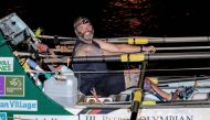 Lee Spencer, a 49-year-old former British marine, known as 'The Rowing Marine', row as he arrives in Cayenne, French Guiana, early on March 11, 2019, after smashing solo Atlantic rowing record from mainland Europe to South America. AFP / Jody Amiet