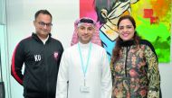 Abdulla Bukhowa, (centre) CEO of Standard Chartered Bank (SCB), Qatar, Karachi United’s Director Imran Ali (left) and SCB’s Associate Director, Communications Corporate Affairs, Tasneem Mirza pose for a group photo.  Picture: Abdul Basit/The Peninsula
