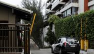 A police car arrives at a condominium where a suspect in the murder of activist and councilwoman Marielle Franco was arrested, the same condominium where Brazil's President Jair Bolsonaro has a residence, in Barra da Tijuca neighborhood, Rio de Janeiro, B