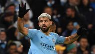 Manchester City's Argentinian striker Sergio Aguero celebrates after scoring their second goal during the UEFA Champions League round of 16 second leg football match between Manchester City and Schalke 04 at the Etihad Stadium in Manchester, north west En