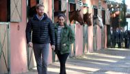 FILE PHOTO: Britain's Prince Harry and Meghan, Duchess of Sussex, visit the Moroccan Royal Federation of Equitation Sports in Rabat, Morocco, February 25, 2019. REUTERS/Hannah Mckay/Pool/File Photo