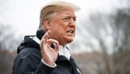 FILE PHOTO: US President Donald Trump speaks to the press before boarding Marine One at the White House in Washington, DC.  AFP / MANDEL NGAN