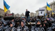 Activists attend a rally held by members of Ukrainian nationalist movements, who demand an investigation into top officials' activities suspected of corruption, in Kiev, Ukraine March 16, 2019. REUTERS/Gleb Garanich