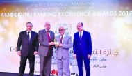A QNB official receiving the award.
