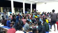 This handout picture taken and released by Indonesia's Badan Nasional Penanggulangan Bencana (BNPB), the accident mitigation agency, on March 17, 2019 shows local residents gather at a temporary shelter in Sentani, near the provincial capital of Jayapura,