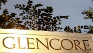 The logo of commodities trader Glencore is pictured in front of the company's headquarters in Baar, Switzerland, July 18, 2017. Reuters/Arnd Wiegmann