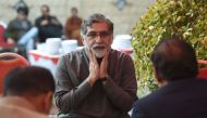 Rizwan Rashid (C), elder brother of Pakistani national Naeem Rashid, who was killed in the attacks to the Christchurch mosques in New Zealand, prays for his brother at Naeem house in Abbottabad on March 17, 2019.  AFP / Farooq Naeem 