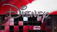 (FILES) In this file photo taken on December 14, 2017 the Disney logo is displayed outside the Disney Store in Times Square in New York City. AFP / GETTY IMAGES NORTH AMERICA / Drew Angerer