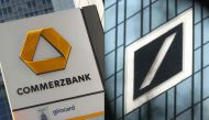 FILE PHOTO: This combination of file pictures taken in Frankfurt am Main, western Germany, and created on January 17, 2019 shows (L) the logo of German bank Commerzbank at the company's headquarters on April 28, 2015 and the logo of German company Deutsch
