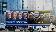 

A billboard in the Israeli city of Ramat Gan in the suburbs of Tel Aviv on March 17, 2019 bearing portraits of Blue and White (Kahol Lavan) political alliance leaders Moshe Yaalon, Benny Gantz, Yair Lapid and Gabi Ashkenazi, with a caption below readi