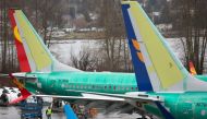 Boeing 737 MAX airplanes are pictured at the Boeing Renton Factory in Renton, Washington.  AFP / Jason Redmond 
