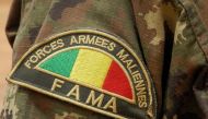 Detail of the badge of a member of the Malian Army (Fama), in Anderamboukane, in Menaka region, on March 22, 2019. AFP / Agnes Coudurier 