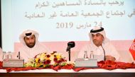 Rashid Nasser Al Kaabi (left), Vice-Chairman of the Board of Directors of QIIB and Jamal Abdullah Al Jamal, QIIB’s Deputy CEO, at the Bank’s Extraordinary General Assembly Meeting, held yesterday.