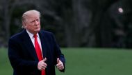 US President Donald Trump reacts as he returns to the White House after U.S. Attorney General William Barr reported to congressional leaders on the submission of the report of Special Counsel Robert Mueller in Washington, U.S., March 24, 2019. REUTERS/Car