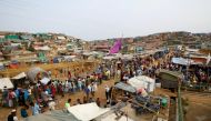 FILE PHOTO: Rohingya refugees gather at a market inside a refugee camp in Cox's Bazar, Bangladesh, March 7, 2019. REUTERS/Mohammad Ponir Hossain