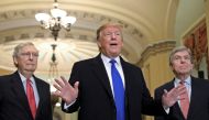 U.S. President Donald Trump talks with reporters next to Senate Majority Leader Mitch McConnell (R-KY) and Senator Roy Blunt (R-MO) as he arrives for a closed Senate Republican policy lunch on Capitol Hill in Washington, U.S., March 26, 2019. REUTERS/Bren