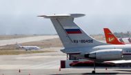 FILE PHOTO: An airplane with the Russian flag is seen at Simon Bolivar International Airport in Caracas, Venezuela March 24, 2019. REUTERS/Carlos Jasso/File Photo