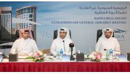 Issa bin Mohammed Al Mohannadi (centre), Vice-Chairman and Managing Director of Barwa Real Estate Company, and other board members at the company’s EGM, held in Doha, yesterday.