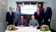 Nakilat’s Chief Executive Officer Abdullah Al Sulaiti (left), Maran Ventures Chairman John Angelicoussis; and other officials during the signing ceremony.