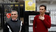 Jamal Sahlabji and his son Ahmed (R) stand in front of a private school in Gaziantep, Turkey, March 6, 2019. Picture taken March 6, 2019. Reuters/Umit Bektas