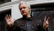 FILE PHOTO: WikiLeaks founder Julian Assange is seen on the balcony of the Ecuadorian Embassy in London, Britain, May 19, 2017. REUTERS/Peter Nicholls