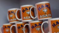 FILE PHOTO: Mugs featuring India's ruling Bharatiya Janata Party (BJP) are on display for sale outside the venue of an election rally addressed by Prime Minister Narendra Modi in Meerut in the northern Indian state of Uttar Pradesh, India, March 28, 2019.