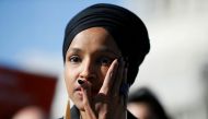 Rep. Ilhan Omar (D-MN) wipes tears from her eye as she speaks about Trump administration policies towards Muslim immigrants at a news conference by members of the U.S. Congress 