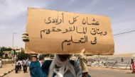 Sudanese protestors gather to march for demanding a civilian transition government, near the central military headquarters in Khartoum, Sudan on April 12, 2019. (Anadolu Agency)