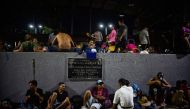 Central American migrants heading in caravan to the US rest at the park Hidalgo in Tapachula in Mexico on April 12, 2019.   AFP / PEP COMPANYS