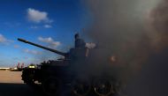 Members of Libyan National Army (LNA) commanded by Khalifa Haftar, get ready before heading out of Benghazi to reinforce the troops advancing to Tripoli, in Benghazi, Libya April 13, 2019. REUTERS/Esam Omran Al-Fetori