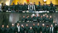 Iranian MPs wearing the outfits of the Islamic Revolutionary Guards Corp (IRGC) during a parliamentary session at the Islamic Consultative Assembly in Tehran on April 9 2019.  AFP 