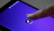 FILE PHOTO: The logo of the TikTok application is seen on a mobile phone screen in this picture illustration taken February 21, 2019. REUTERS/Danish Siddiqui