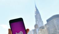 Lyft transport application is seen on a smartphone in New York City in this file photo taken on June 29, 2018. AFP/Angela Weiss
