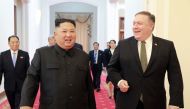 FILE PHOTO: North Korea's leader Kim Jong Un (L) greeting US Secretary of State Mike Pompeo (R) at the Paekhwawon State Guesthouse in Pyongyang.  AFP / KCNA VIA KNS