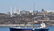 A vessel sails with backdrop of the Russian far-eastern city of Vladivostok, Russia, April 19, 2019. Reuters/Yuri Maltsev 