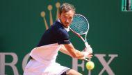 Russia's Daniil Medvedev hits a return to Serbia's Dusan Lajovic during the semi final tennis match of the Monte-Carlo ATP Masters Series tournament in Monaco on April 20, 2019. / AFP / VALERY HACHE