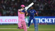 Rajasthan Royals batsman Steve Smith (R) plays a shot during the 2019 Indian Premier League (IPL) Twenty20 cricket match between Rajasthan Royals and Mumbai Indians at the Sawai Mansingh Stadium in Jaipur on April 20, 2019. (AFP / Money SHARMA)