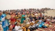 Folk artists play traditional music for tourists at Kashgar, Xinjiang, Uighur Autonomous Region, China May 2, 2016. Reuters