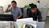 Reuters journalists Wa Lone and Kyaw Soe Oo, who were based in Myanmar, pose for a picture at the Reuters office in Yangon, December 11, 2017. Reuters/Antoni Slodkowski
