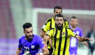 Action from the Amir Cup match between Qatar SC and Muaither at the Grand Hamad Stadium yesterday.