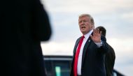 U.S. President Donald Trump waves after arriving aboard Air Force One after spending Easter weekend at his Mar-a-Lago club, at Joint Base Andrews, Maryland, U.S., April 21, 2019. REUTERS/Al Drago