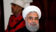 FILE PHOTO: Iranian President Hassan Rouhani speaks during a news conference with Iraqi President Barham Salih (not pictured) in Baghdad, Iraq, March 11, 2019. REUTERS/Thaier al-Sudani